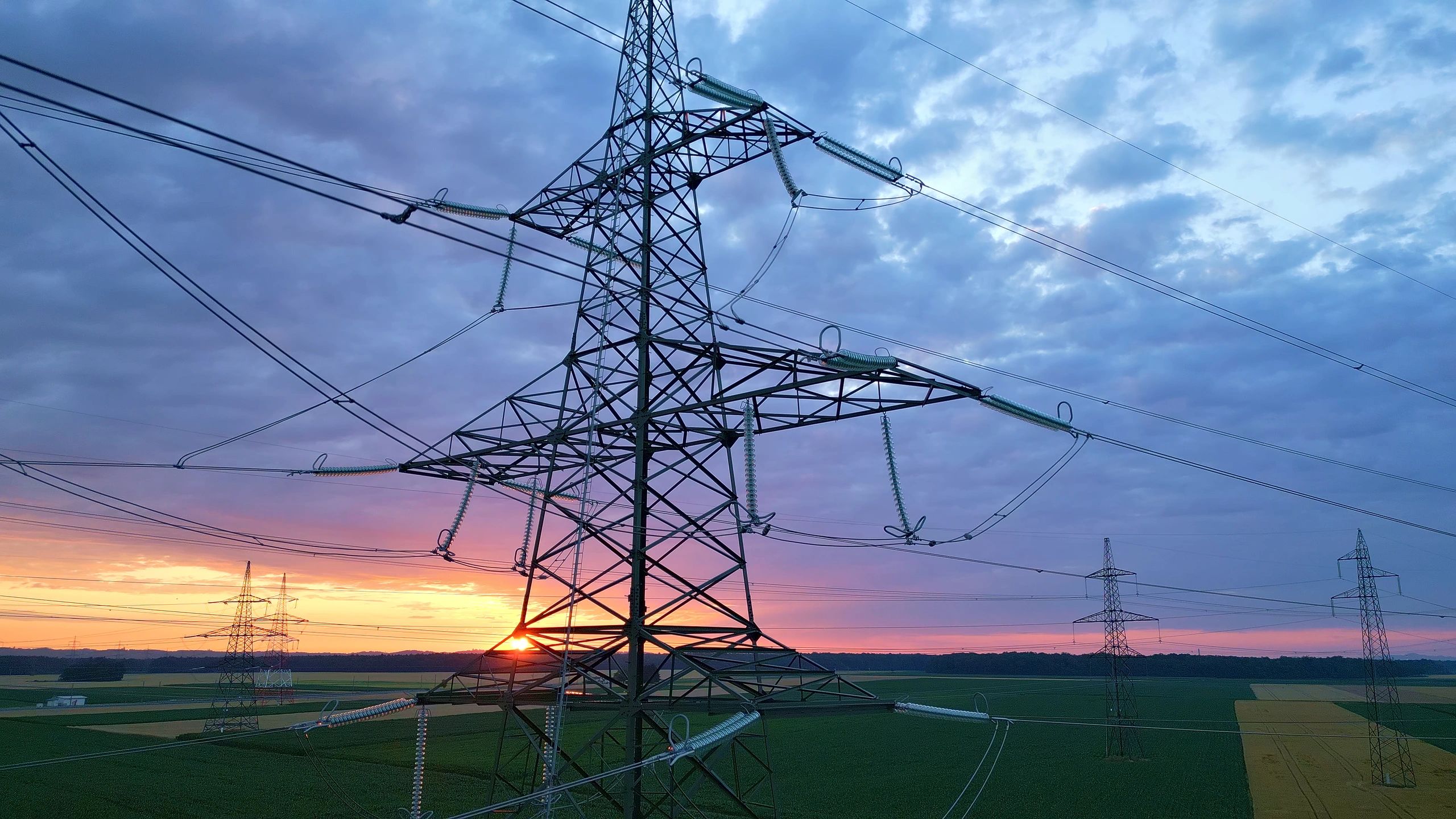 Power transmission infrastructure at sunset